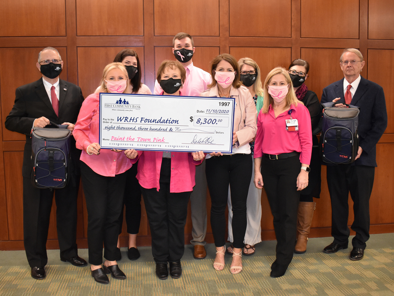 FIRST COMMUNITY BANK RAISES FUNDS FOR BREAST CANCER AWARENESS